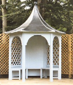 Classical Gazebos - Holkham Gazebo Cathedral Roof . Solid back and Trellis sides